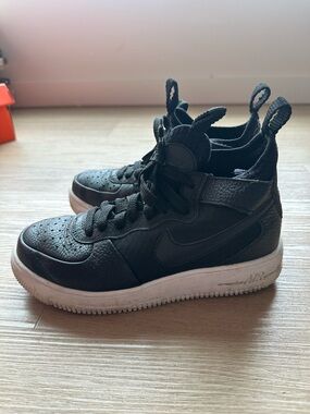 Nike Black High-Top Athletic Sneakers with White Sole